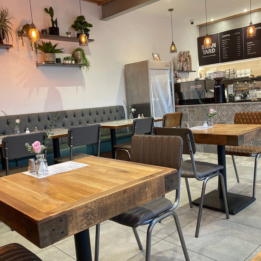 Inside Swan Yard: oak tables, leather chairs, Edison bulbs and the coffee bar